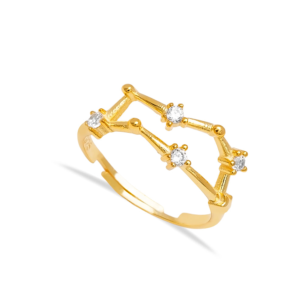 Constellation-inspired gold ring with sparkling white zirconia stones, showcased in a minimalist product image.