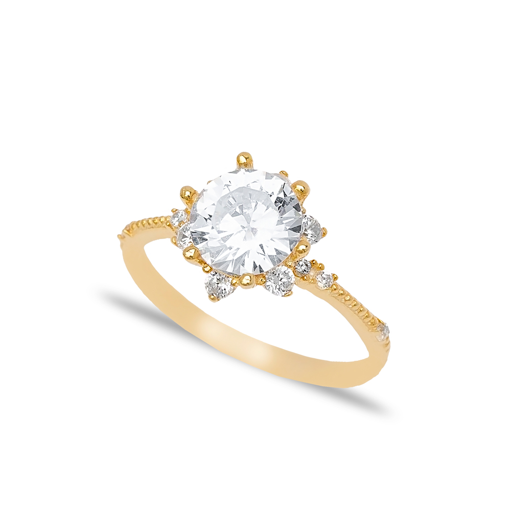 Elegant Cluster Ring with sparkling clear zirconia stone and gold-toned setting, displayed on a plain white background.