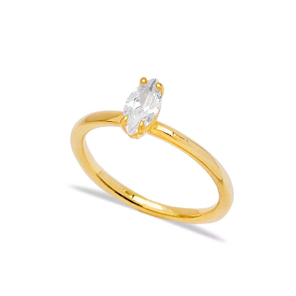 Elegant gold solitaire ring with marquise-cut diamond, exquisite evening accessory for stylish woman