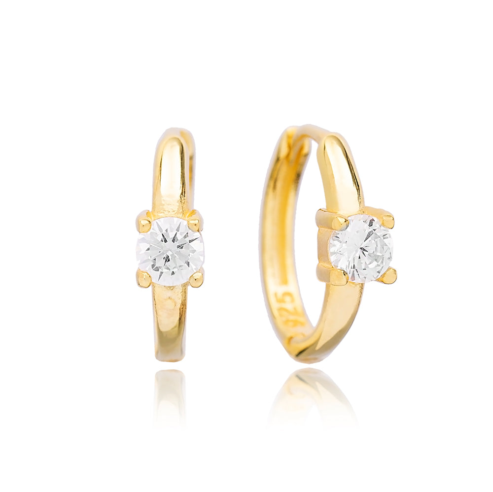 Stone Hoop Earrings - Elegant gold-tone earrings with sparkling stones, perfect for evening occasions.
