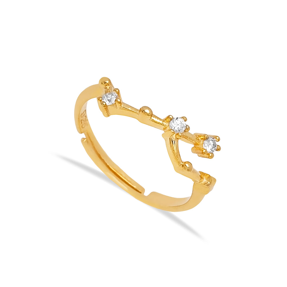 Elegant gold-toned ring with sparkling crystal accents, styled as a constellation of stars. Showcased on a plain white background, highlighting the ring's intricate and eye-catching design from Twin Jewellery.